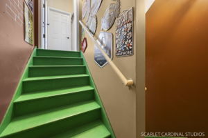 Staircase to basement has so much personality!