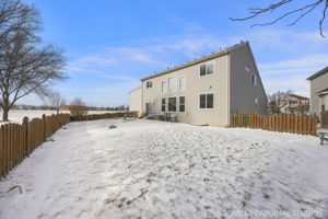 Fully fenced yard, large patio with built-in firepit, with easy access to Homestead Park