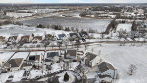 Enjoy pond across the way while sipping coffee on back patio...