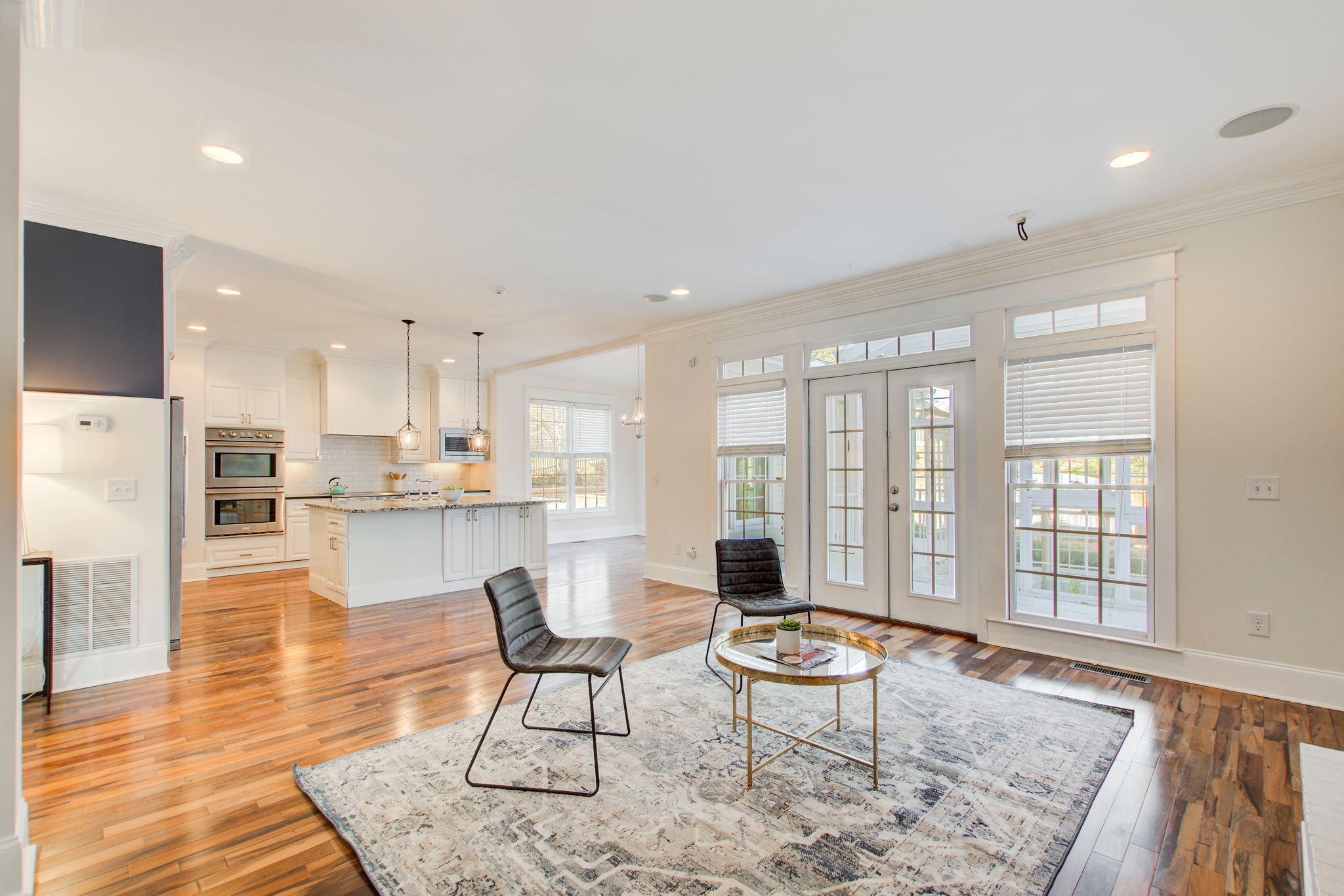 27 Living Room A w Kitchen + Walkout