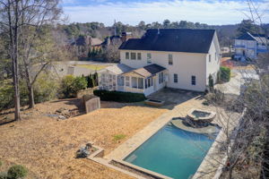 58 Aerial Exterior Rear + Side w Yard  + Driveway