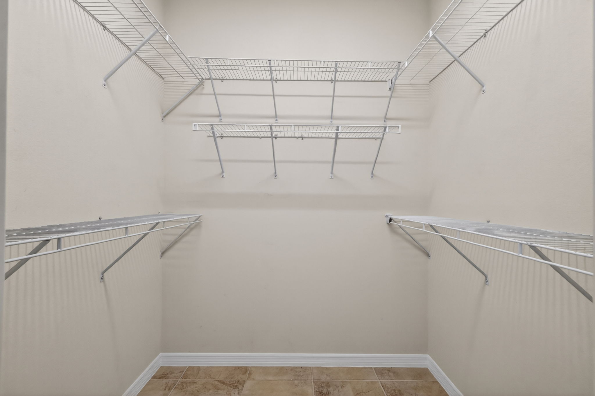 Primary Bedroom First Walk-In Closet