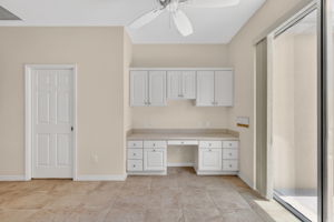 Dinette with Built-In Desk and Sliding-Glass Doors to Side Patio