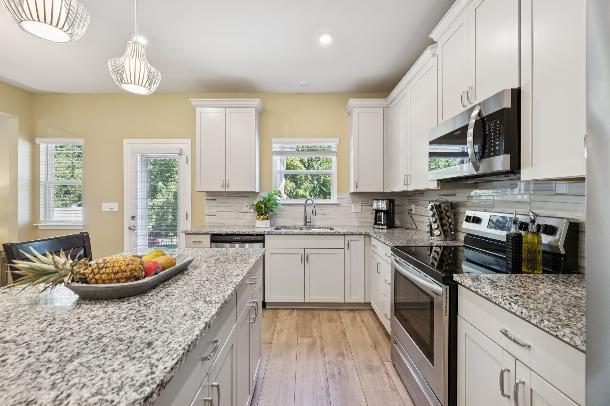 Granite counters, soft-close drawers and upgraded cabinetry.