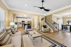 A second layout option - there is plenty of room for a dining table between living room and the kitchen island.