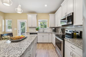 Granite counters, soft-close drawers and upgraded cabinetry.