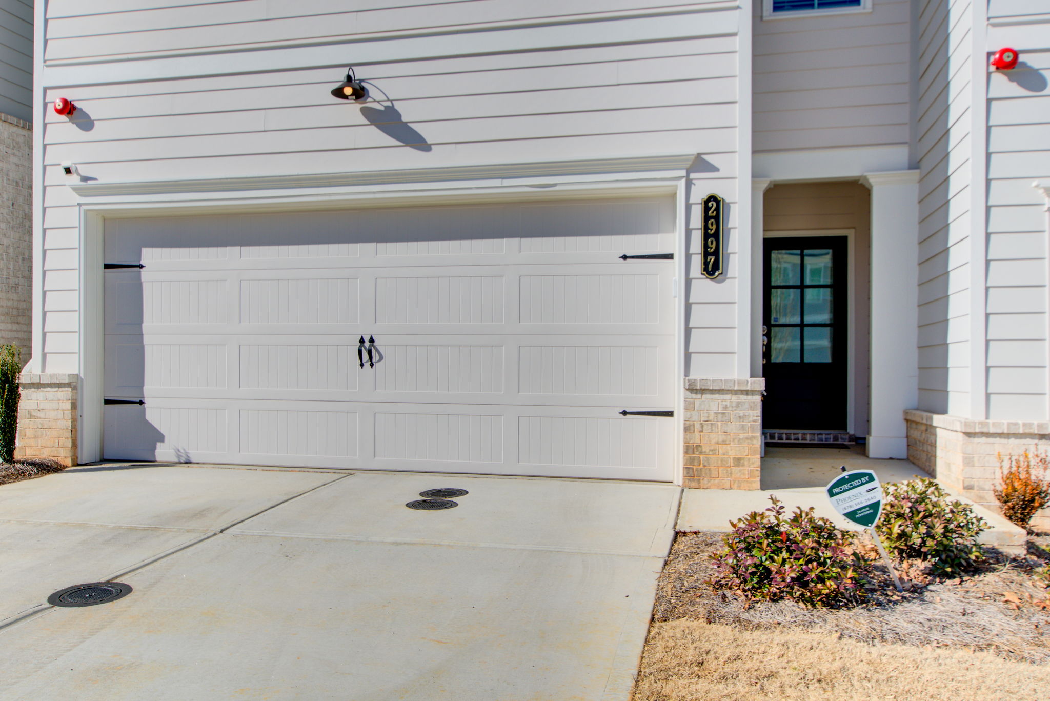 2 Exterior Front Partial Garage + Entry Detail