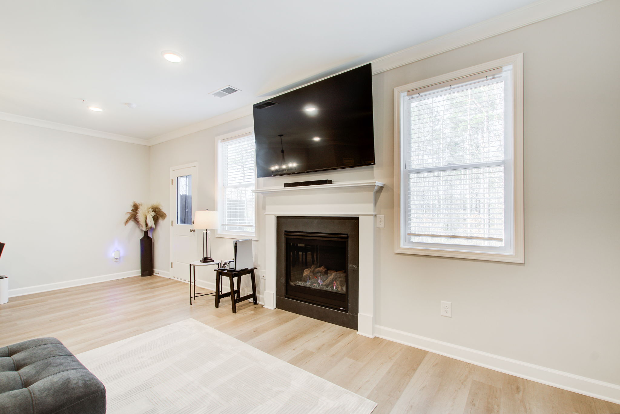 10 Living Room A Partial Fireplace w  Patio Walkout