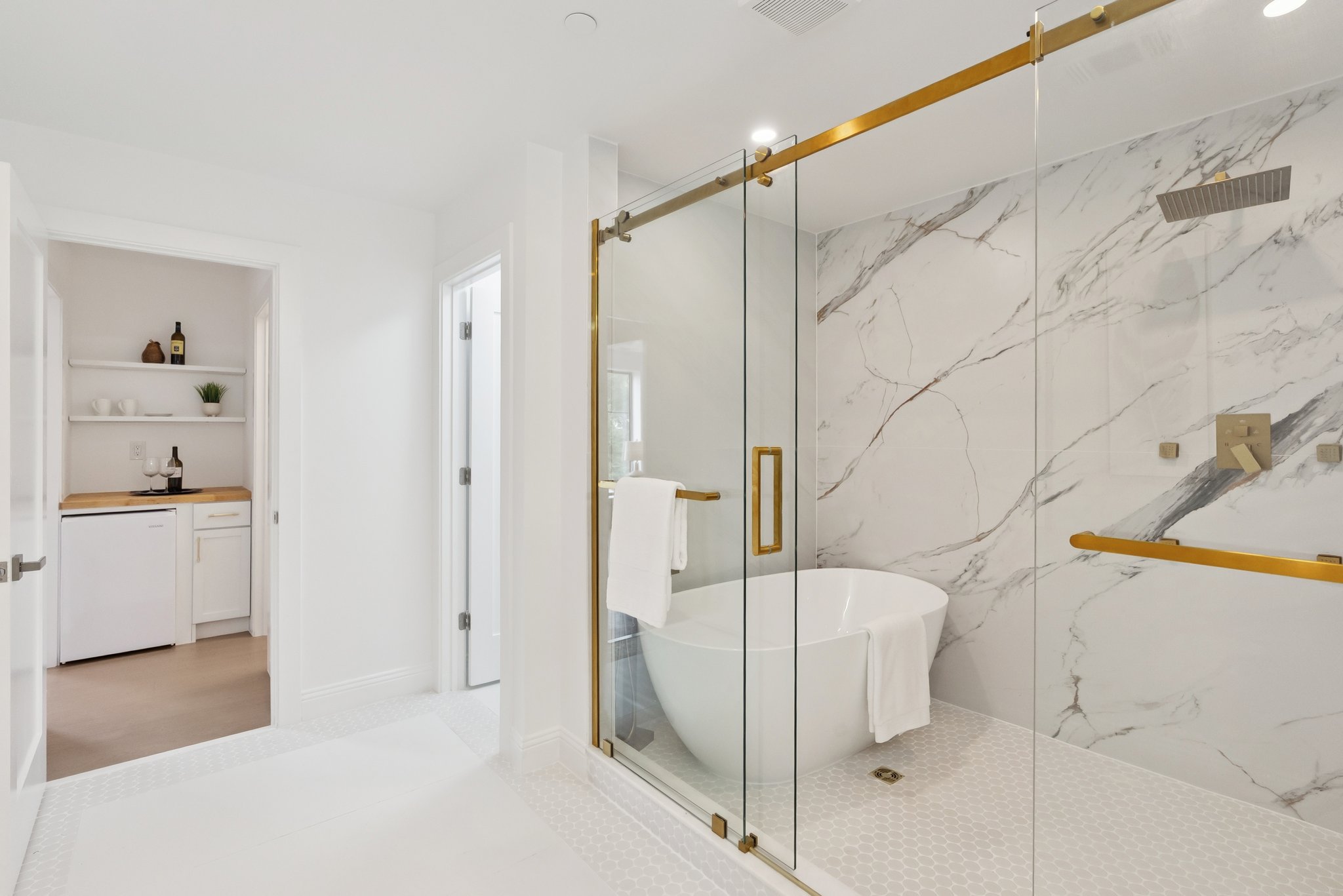 Primary Bathroom with Soaking Tub in Shower Room