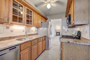 Kitchen opens to Dining Room and Living Room