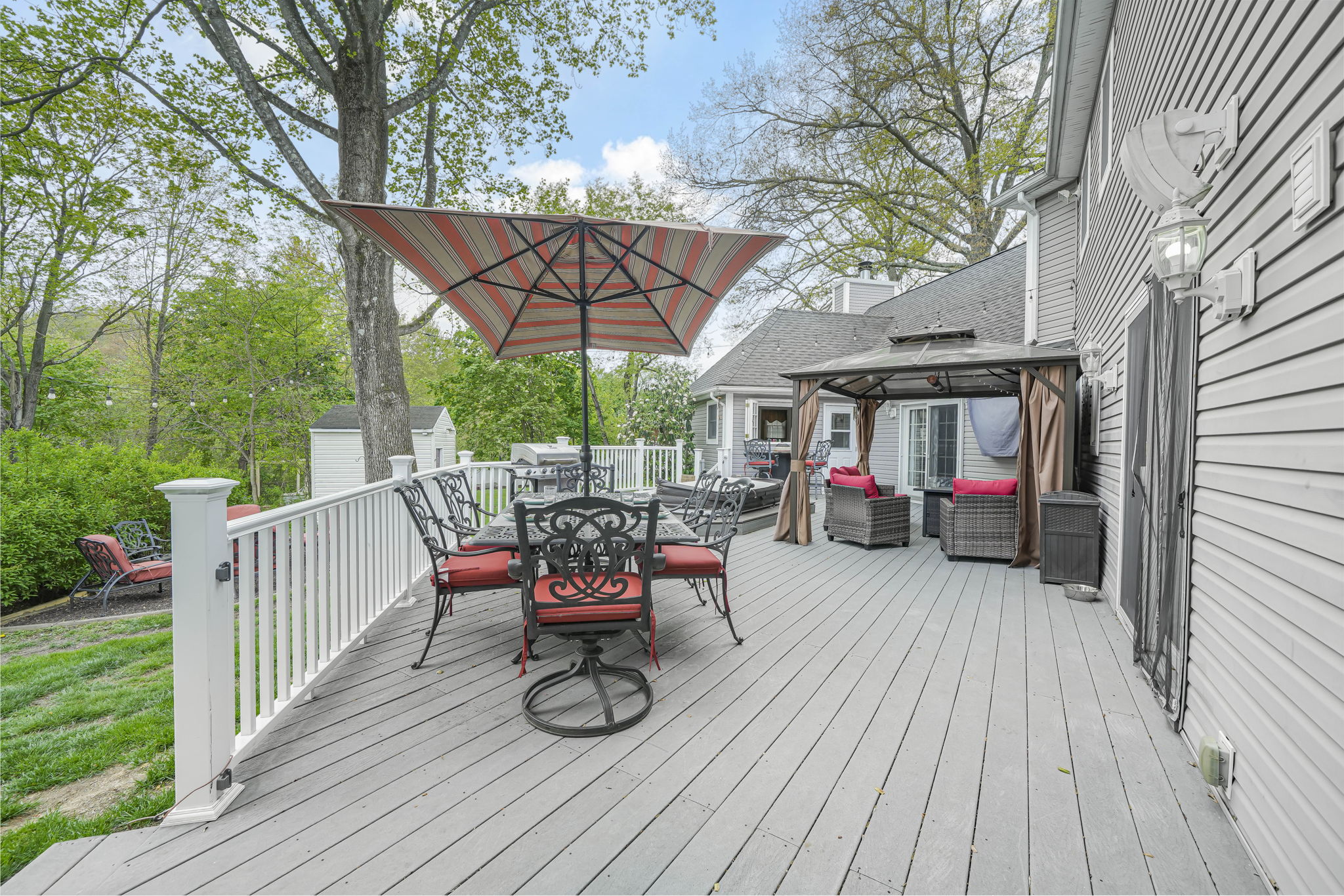 Large Composite Decking with PVC Railings & hot tub