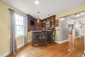 Great Room with Wet Bar and Fireplace, with nearby pass through bar too!