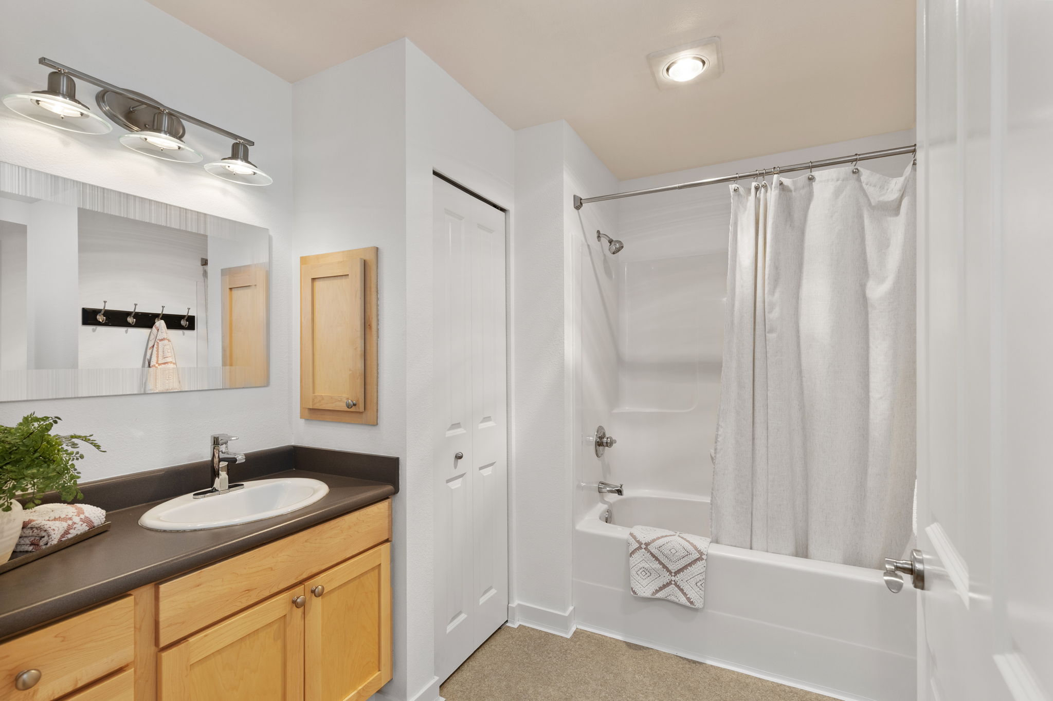 Bathroom featuring ample storage