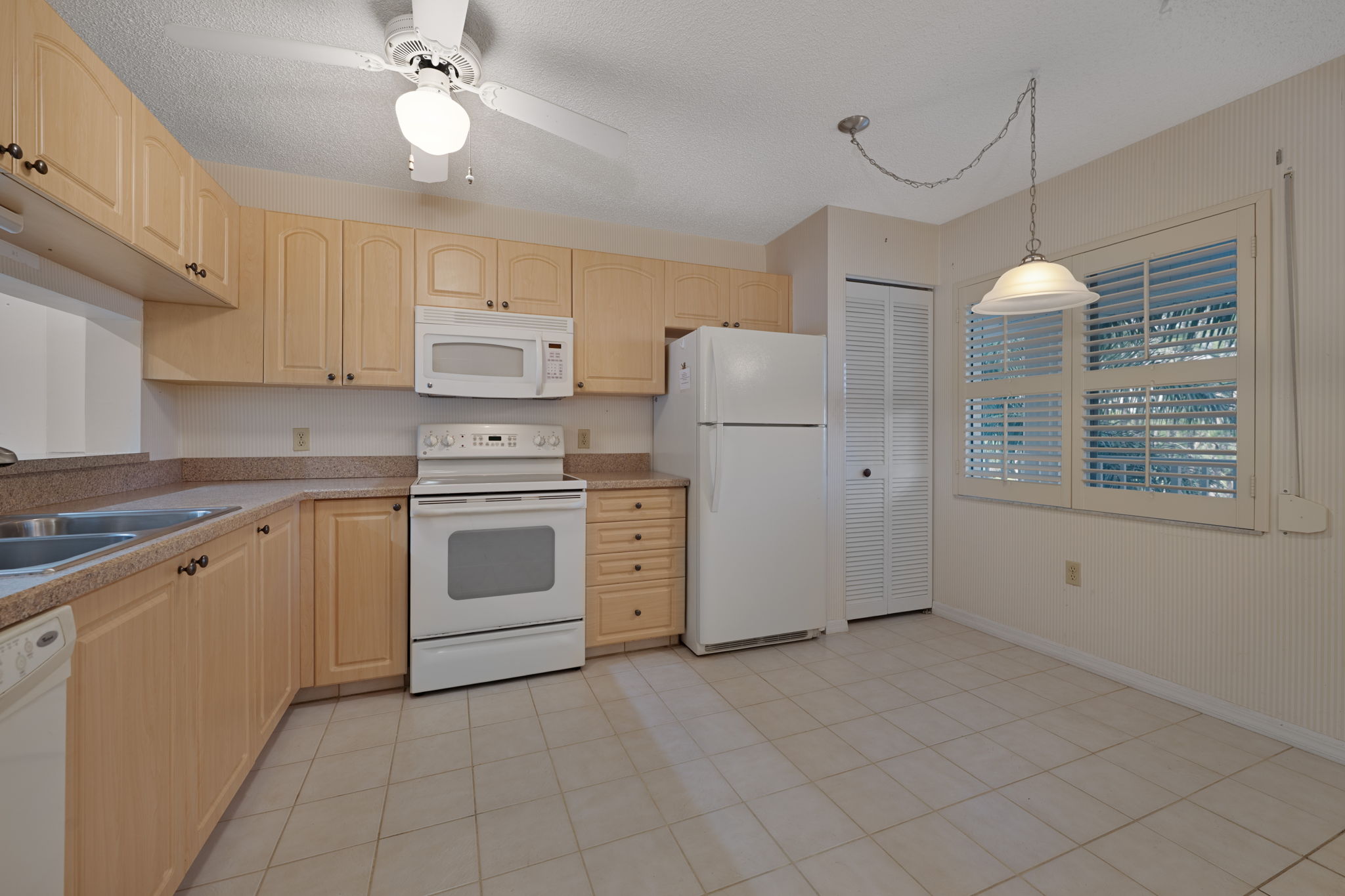 Spacious Eat-In Kitchen with Plantation Shutters, Pantry
