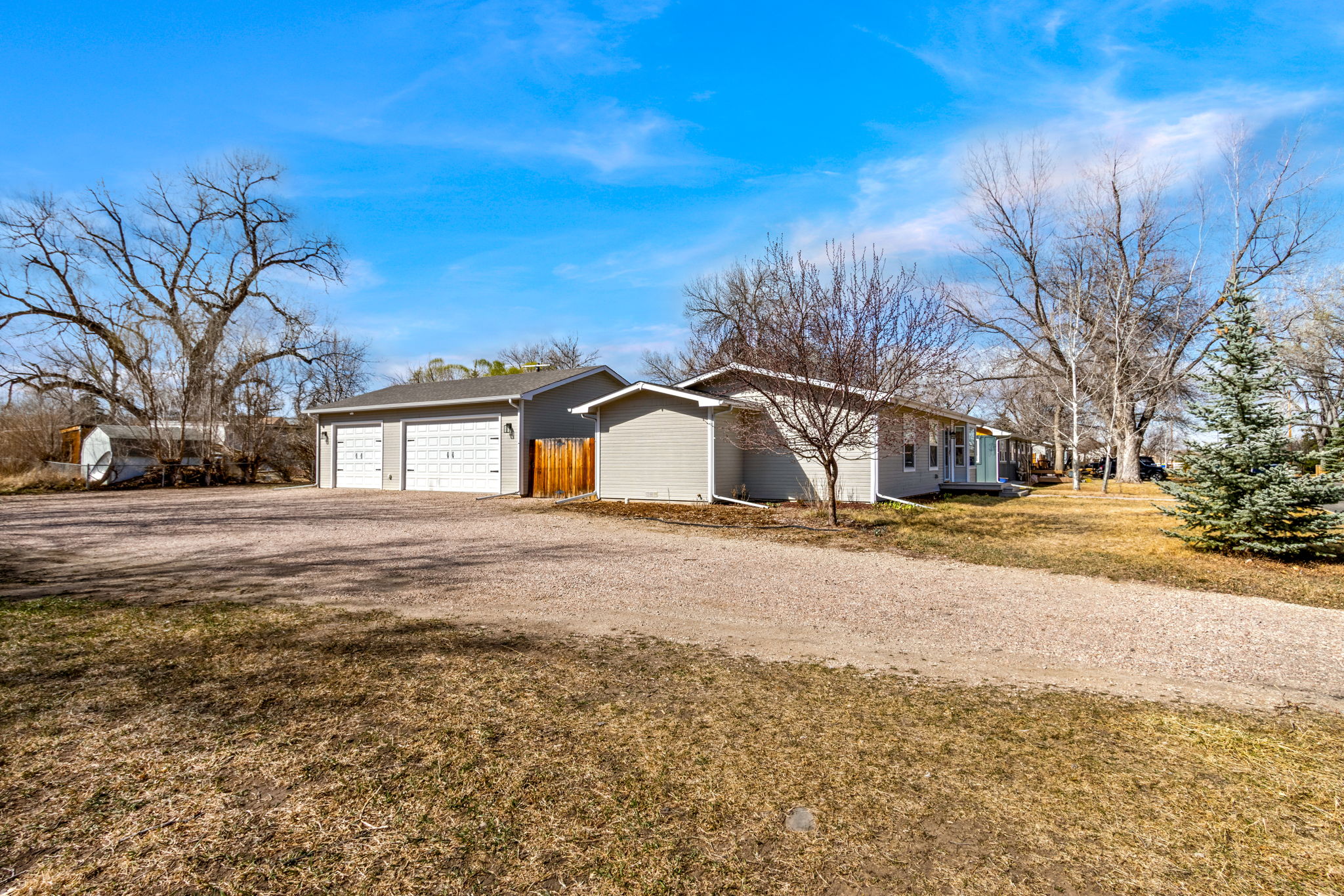 The oversized 3 car garage/shop provides space for many types of hobbies, storage or a workshop.