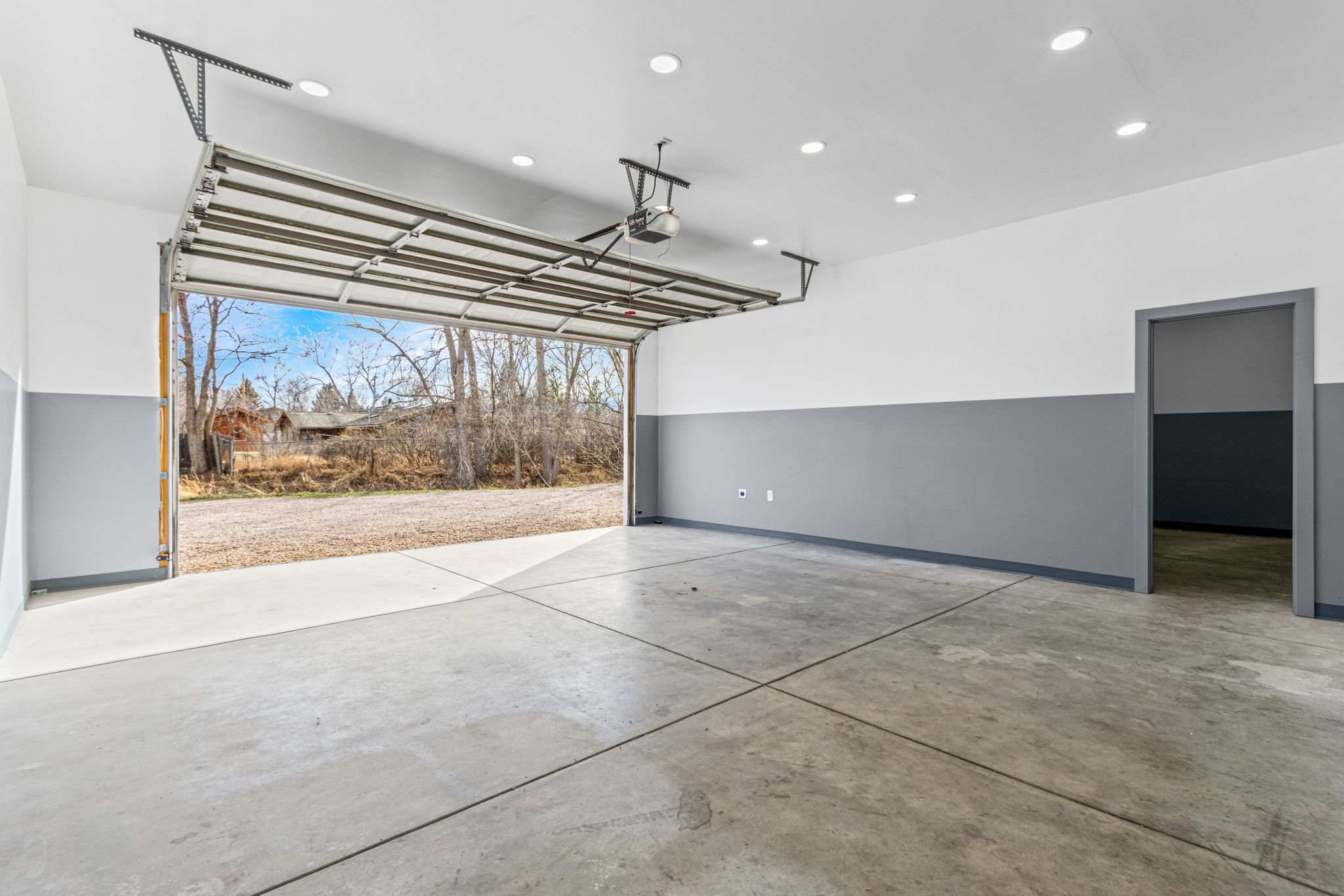 Clean and bright with insulated walls and ceilings. Door separation between the single bay and the double bay.