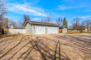 The oversized driveway provides space for multiple vehicles and/or equipment. The corner lot is quiet and gives the feel of not having neighbors too close.