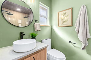 Fully remodeled at a value add of $25,000! Heated floors, dual shower heads, a walk in, curb-less shower.