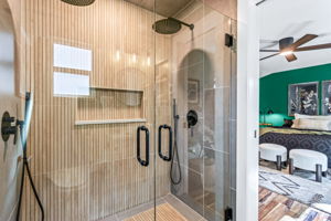 This bathroom update is giving serious spa vibes! Heated floors, dual shower heads, a walk in, curb-less shower.