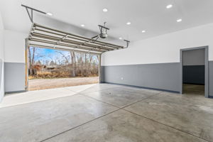 Clean and bright with insulated walls and ceilings. Door separation between the single bay and the double bay.