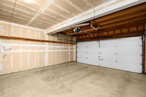 Attached 2 Car Garage - Includes Work Bench & 50V Outlet for EV Charging