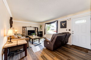 Living room area with surround sound speakers
