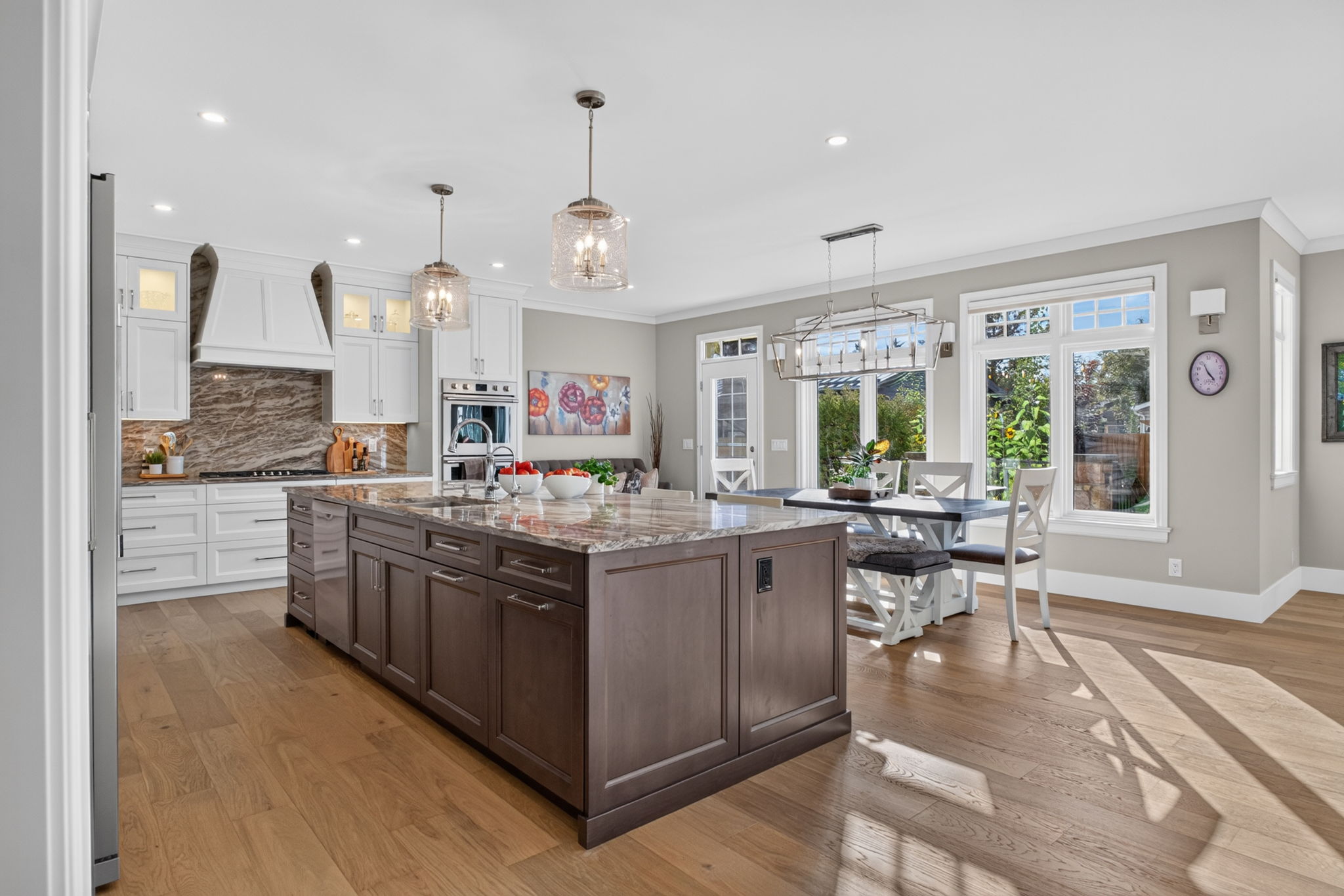 Chef's kitchen with a five-seat island