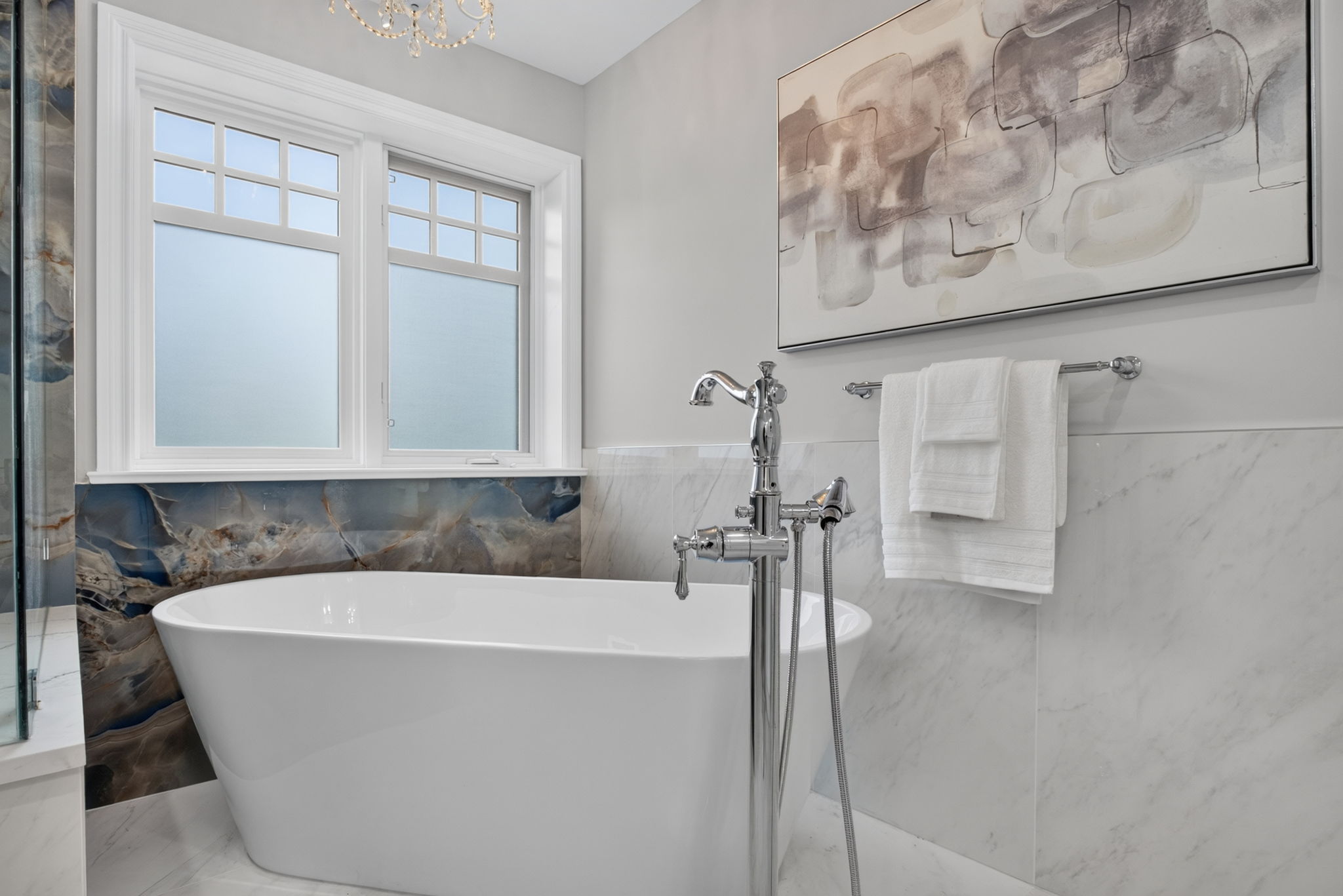 Five-piece ensuite with freestanding soaker tub