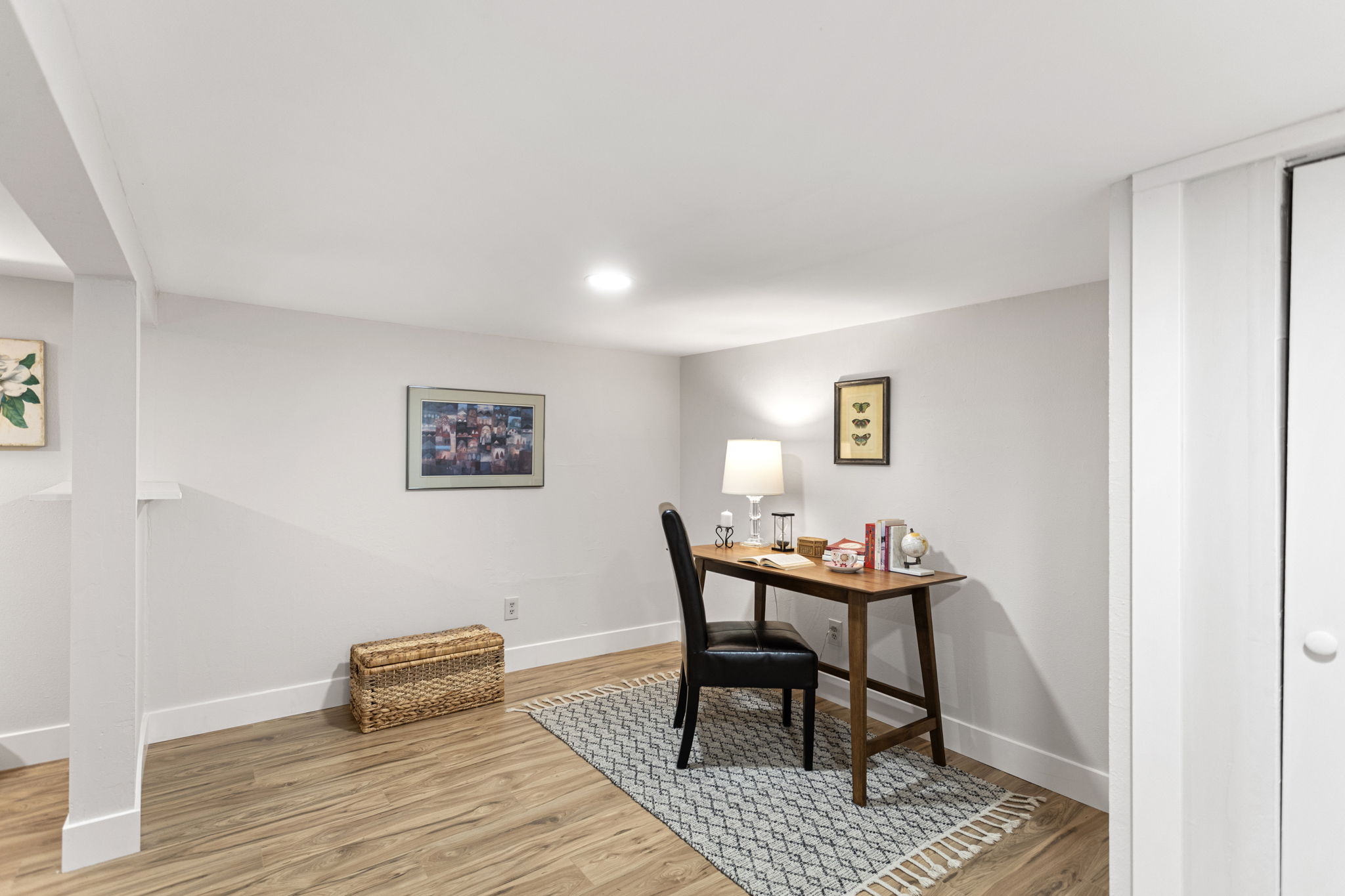 Fresh sheetrock, recessed lighting, closet space with shelf. Two zones — office, hobby room, guest space, or some combination of all three.