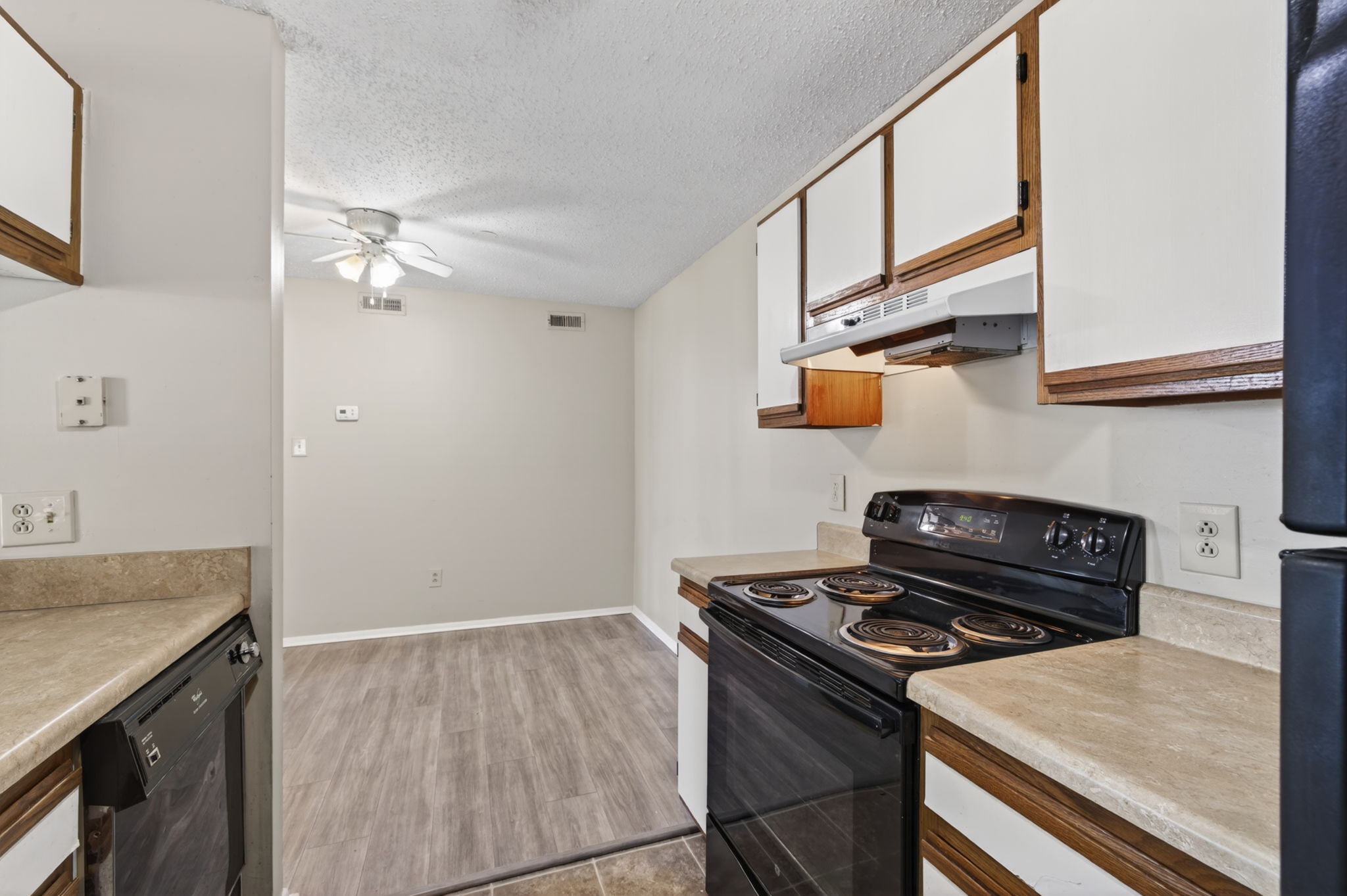 Kitchen flows to dining and living room.