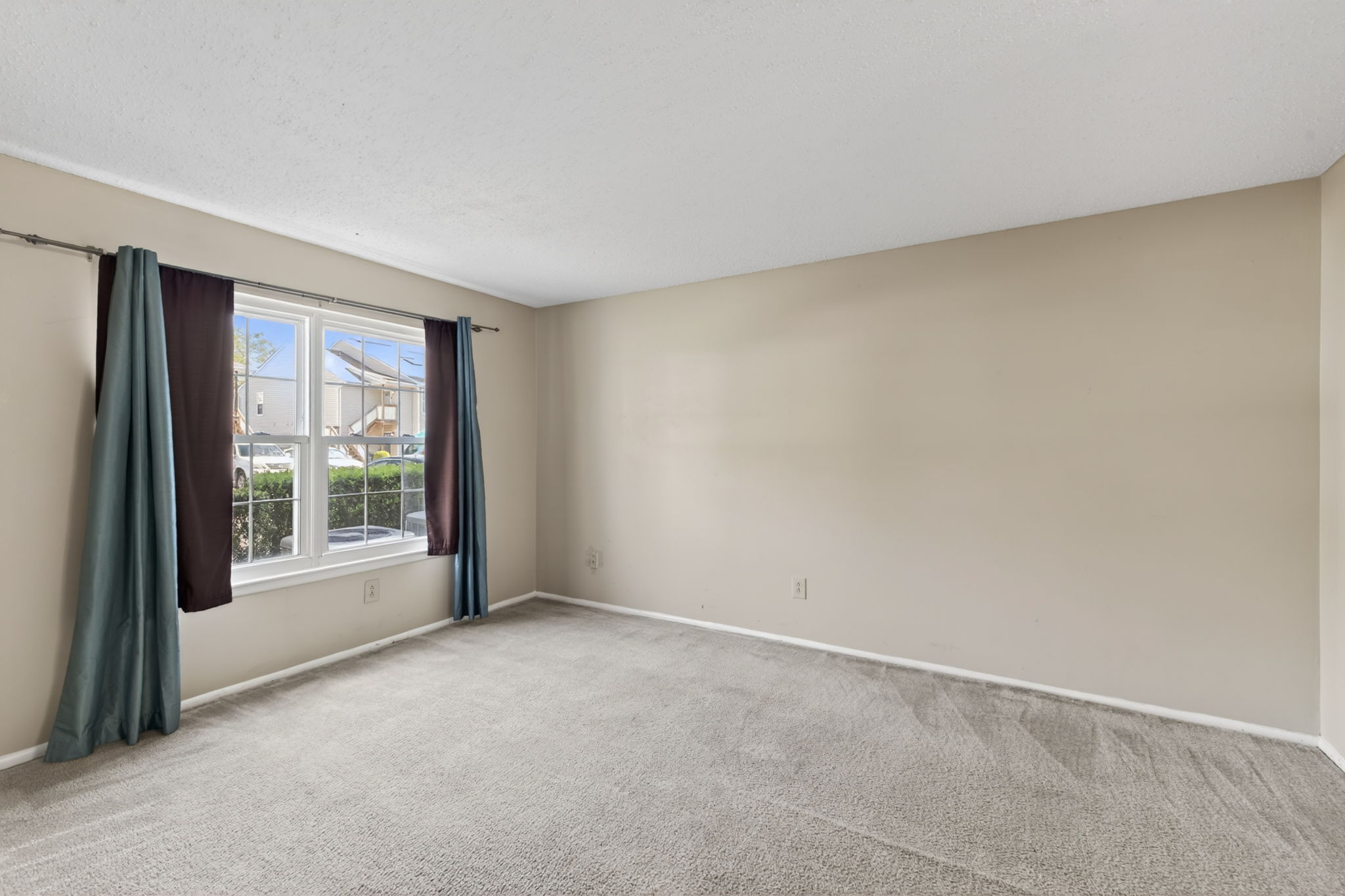 Comfortable primary suite with walk-in closet.
