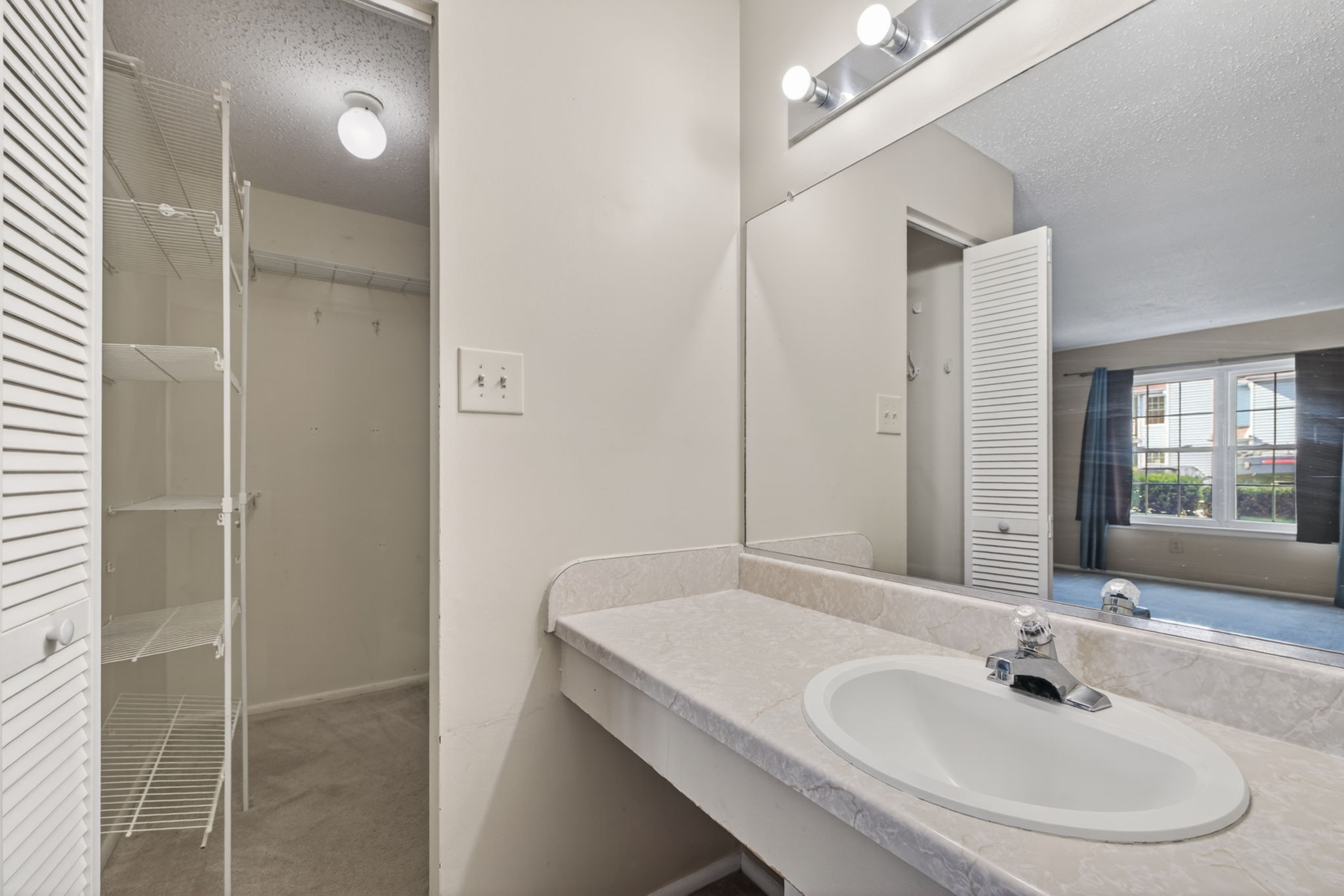 Primary Bedroom private vanity.