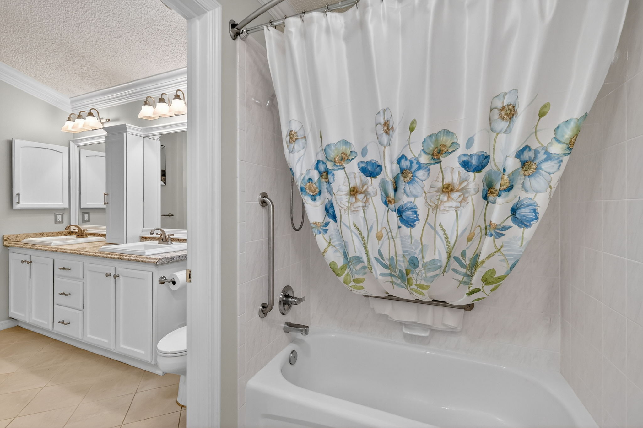 Second Bathroom with Convenient Connecting Door to Primary Bathroom