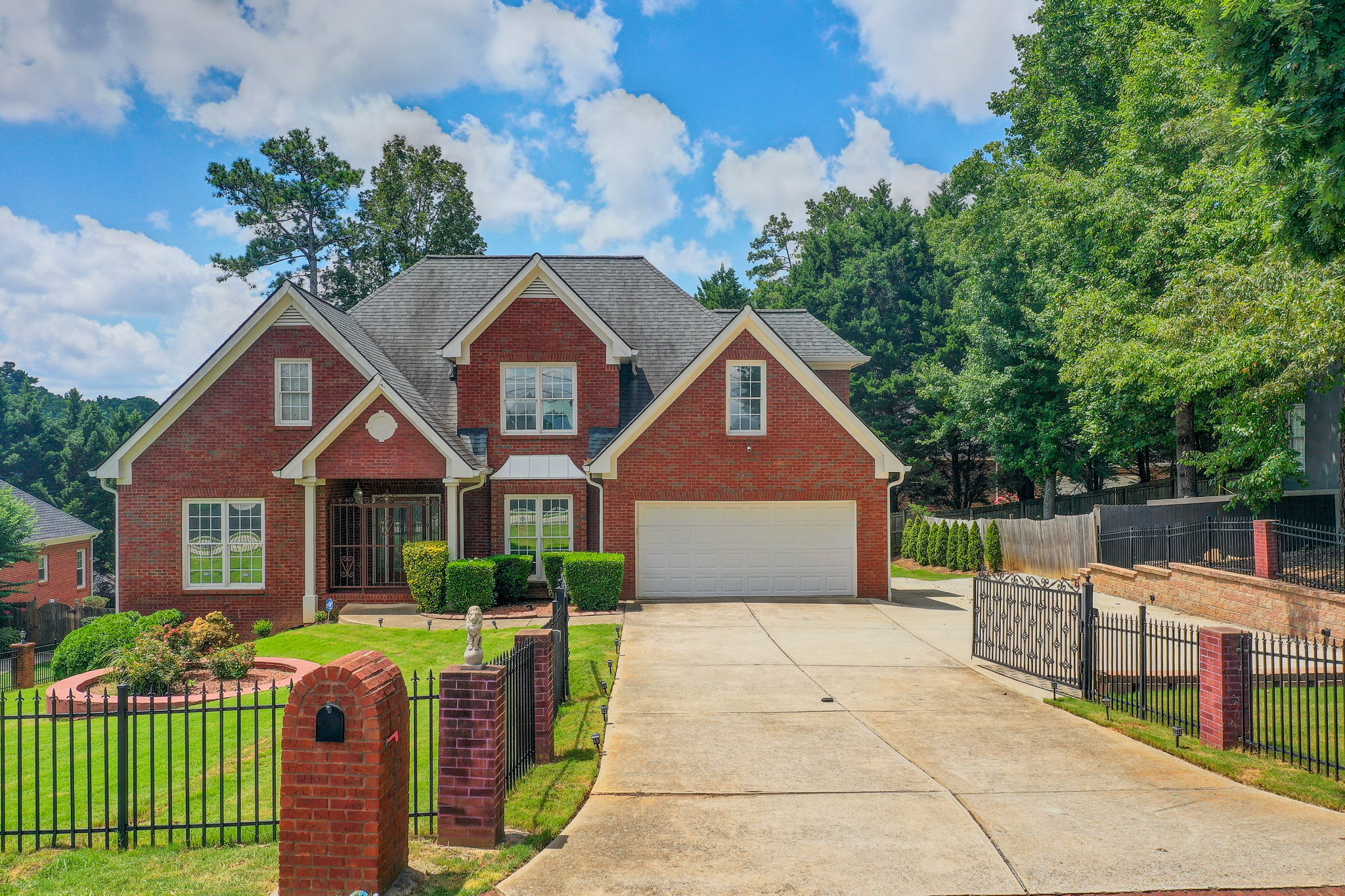 50 Aerial Ext Front B w Driveway + Parking Pad