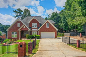 50 Aerial Ext Front B w Driveway + Parking Pad