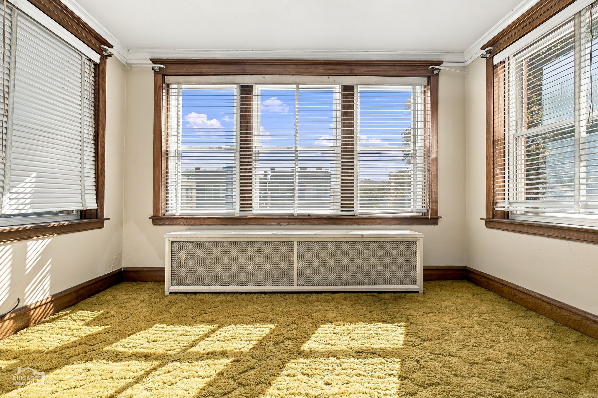 Second floor sunroom (hardwood under carpet)