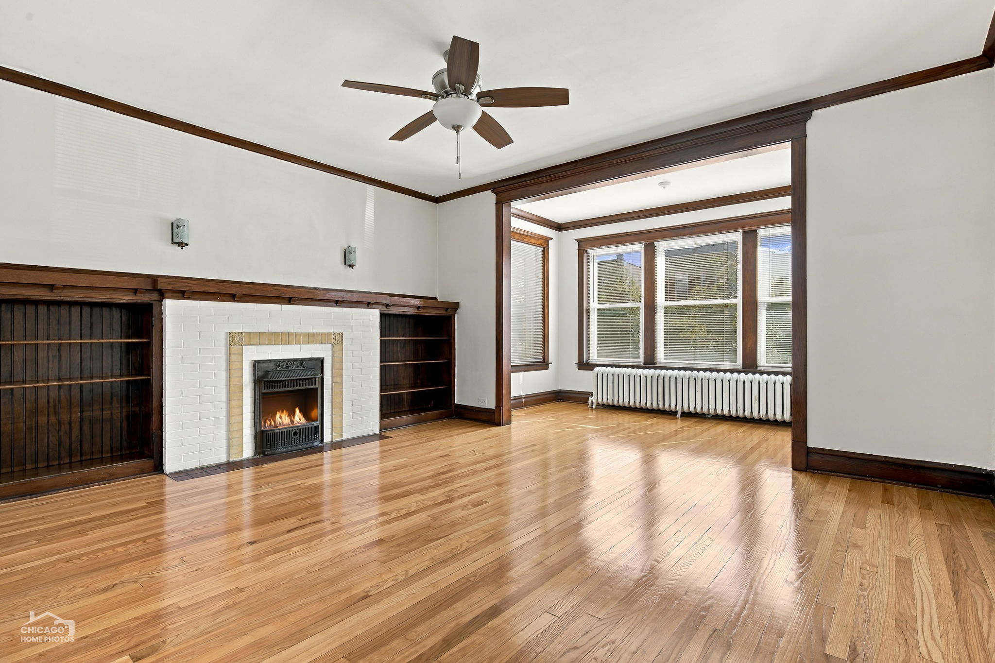 First floor living room, decorative fireplace and built-ins