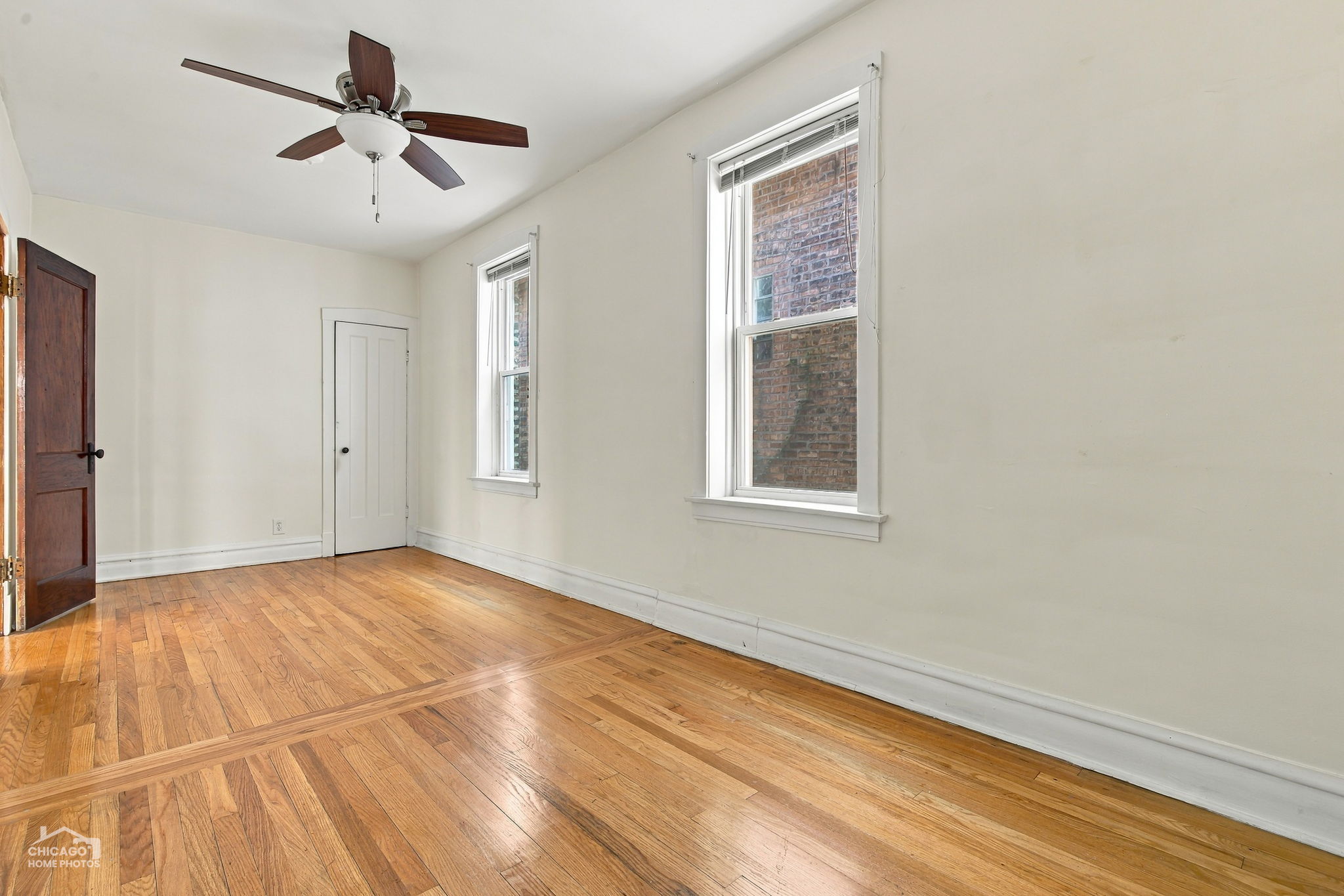 First floor, primary bedroom is two bedrooms combined into one