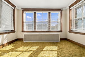 Second floor sunroom (hardwood under carpet)