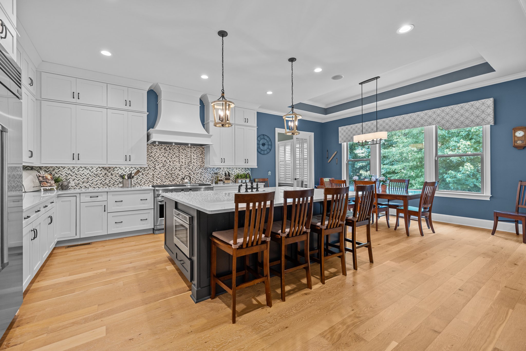 Ceiling High Cabinets & Large Island with Seating Space