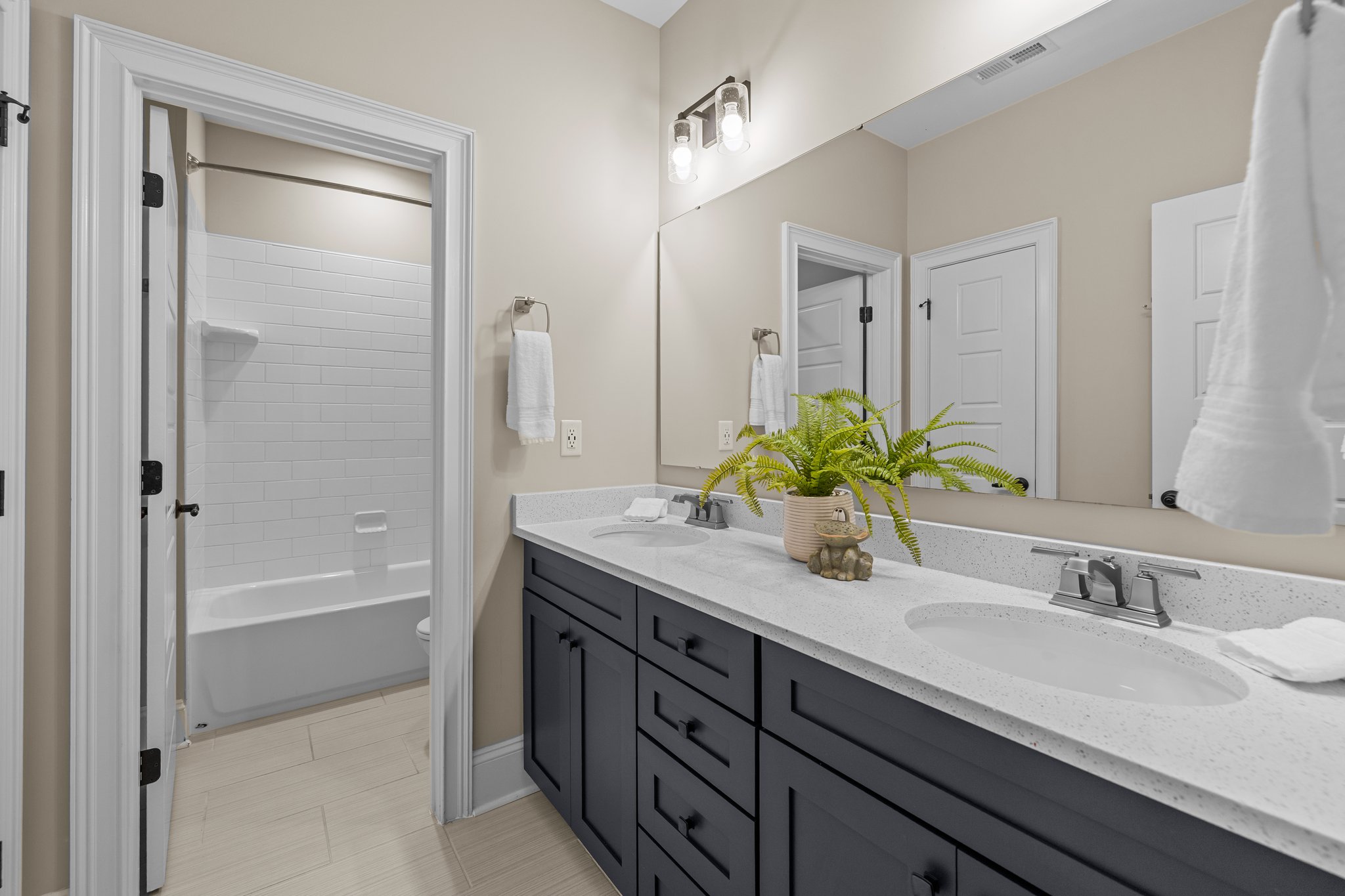 2nd Level Shared Bathroom with Double Vanity