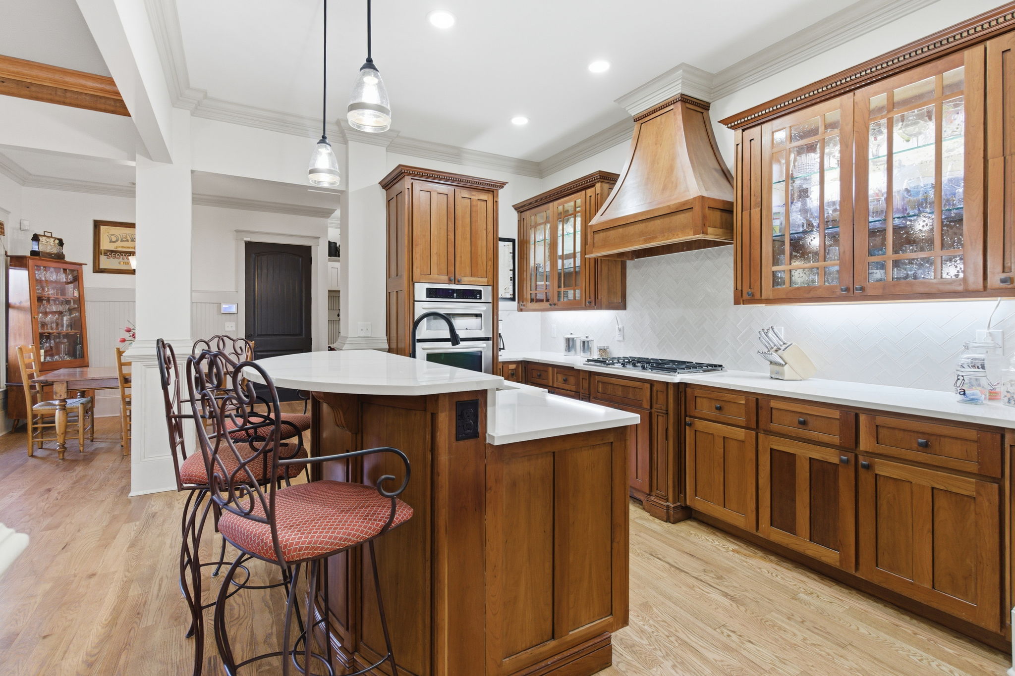 PECAN CABINETS AND BREAKFAST BAR