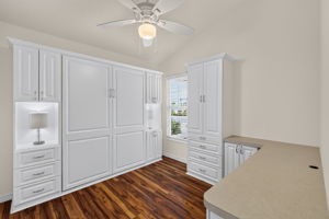 Second Bedroom with Murphy Bed, Custom Cabinetry, and Built-In Desk