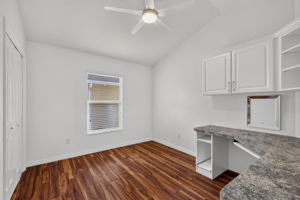 Third Bedroom with Built-In Desk and Custom Cabinetry