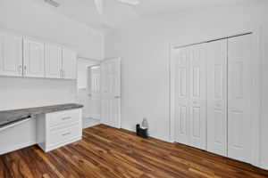 Third Bedroom with Built-In Desk and Custom Cabinetry