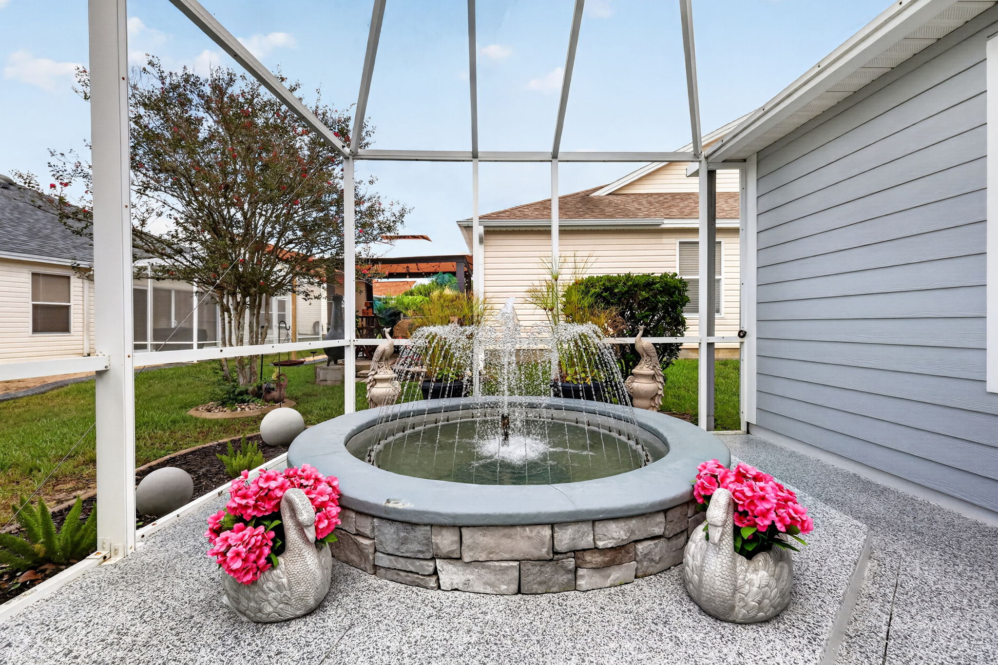 Birdcage and water fountain