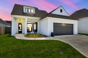 307 Harvest Creek Ln-1 day to dusk.jpeg
