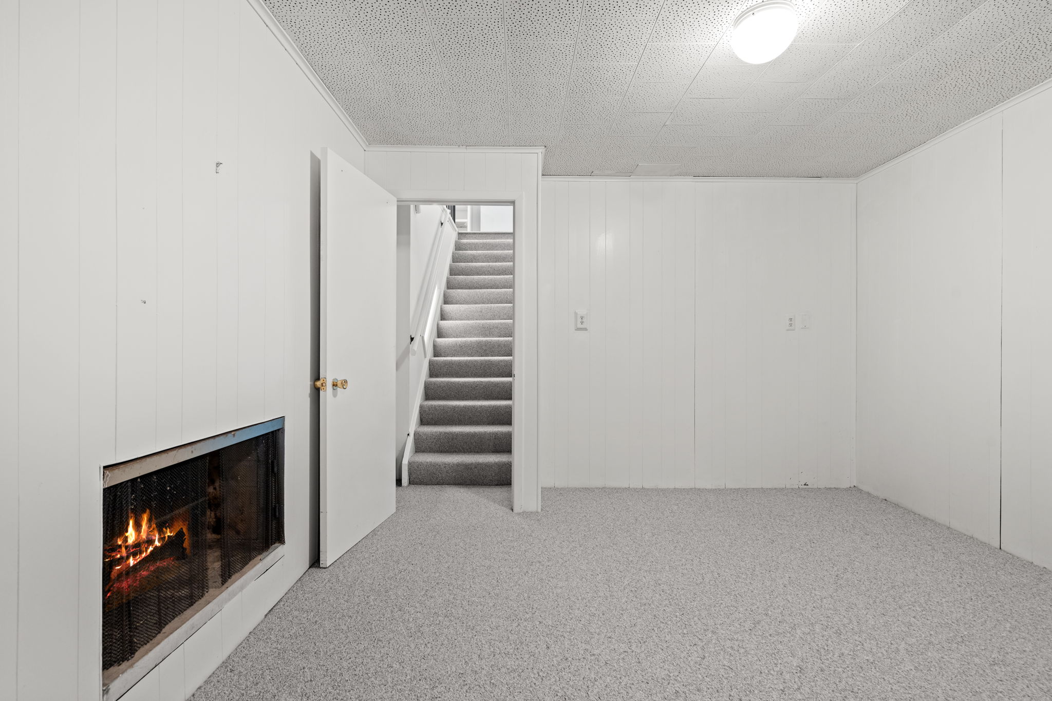Finished basement. Simulated fire
