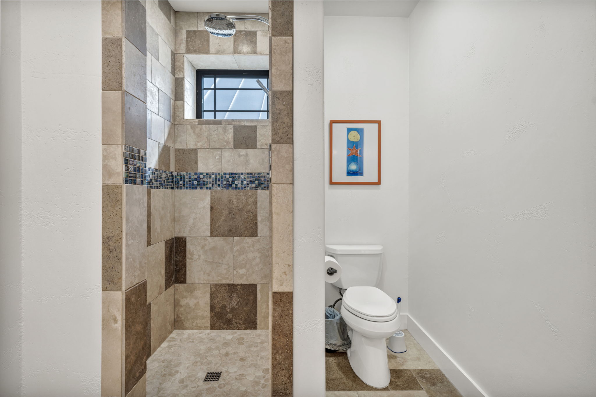 One of two full baths with walk-in shower