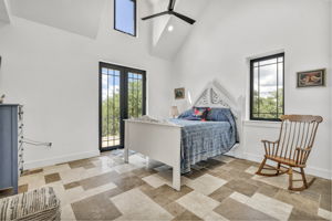 Main bedroom offers abundant space, walk-in closet, full bath, French doors out to the patio and a VIEW!